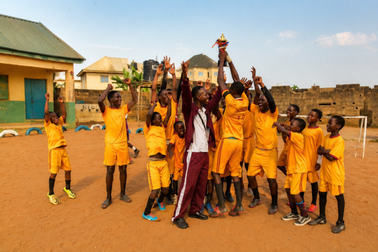 Young footballers celebrating