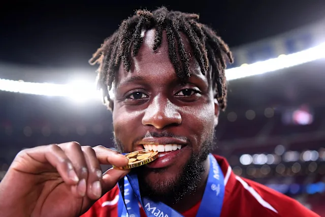 Divock Origi winning the Champions League with Liverpool