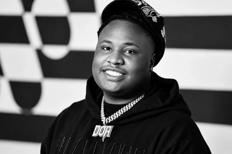 Black-and-white portrait of Tay Keith