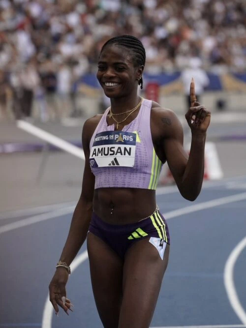 Tobi Amusan posing after running 12.28 seconds